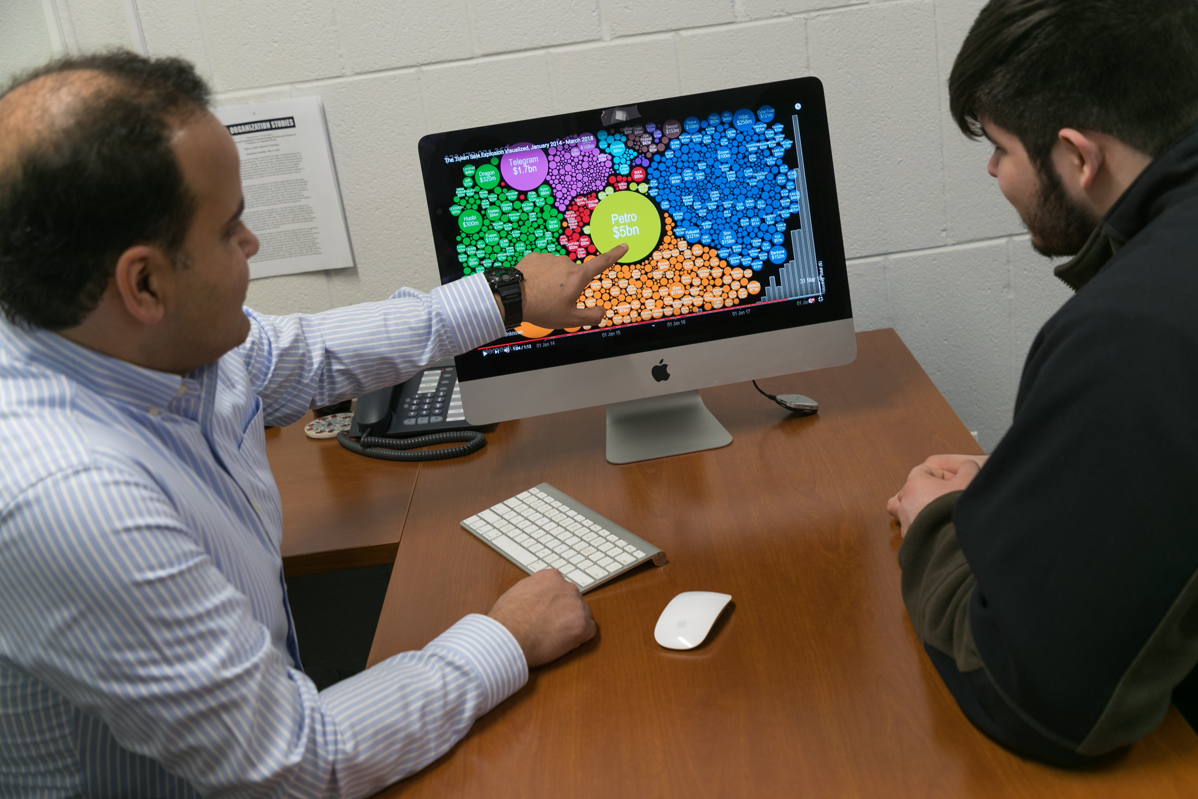 student and professor working