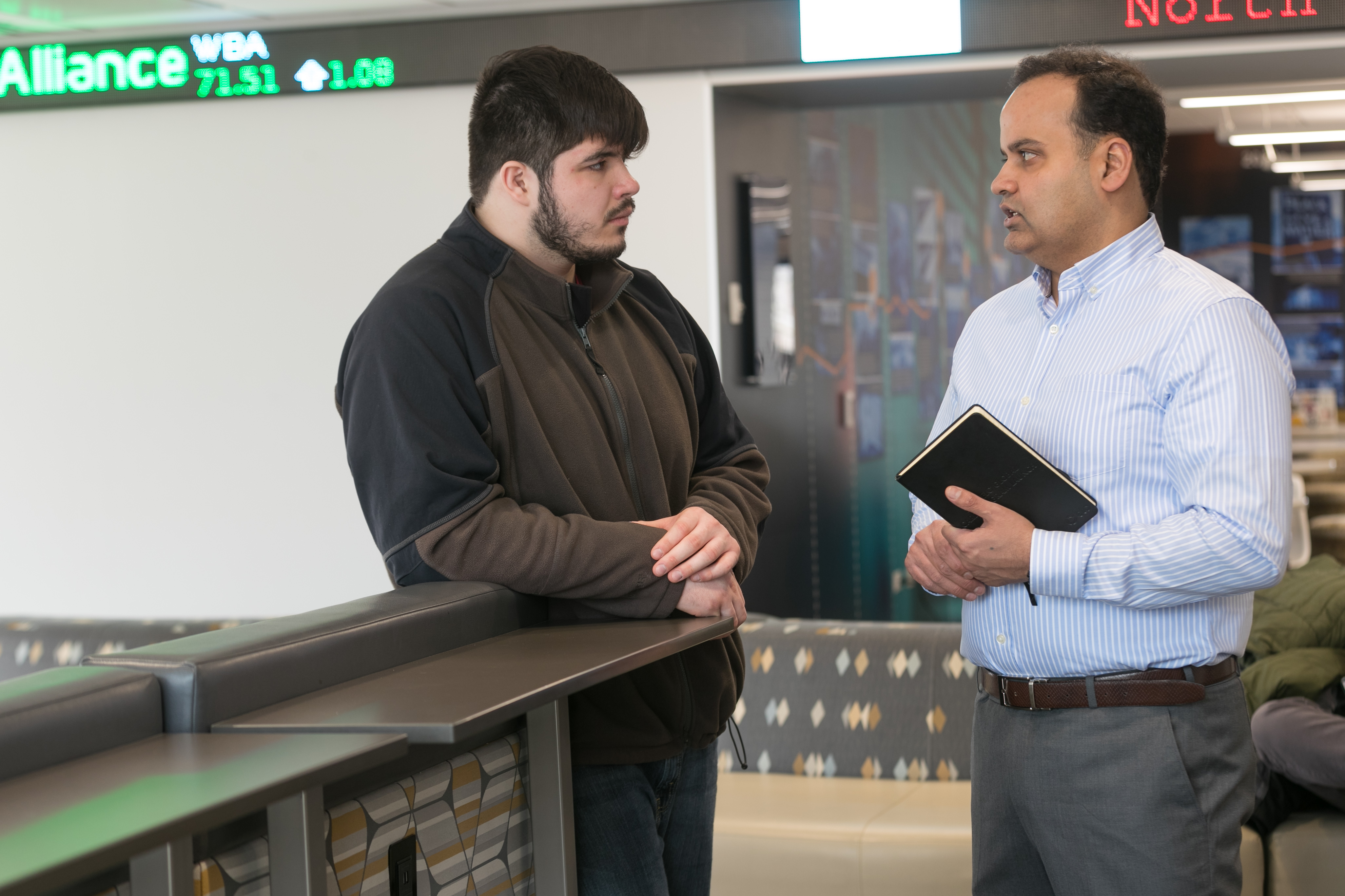 student and professor talking
