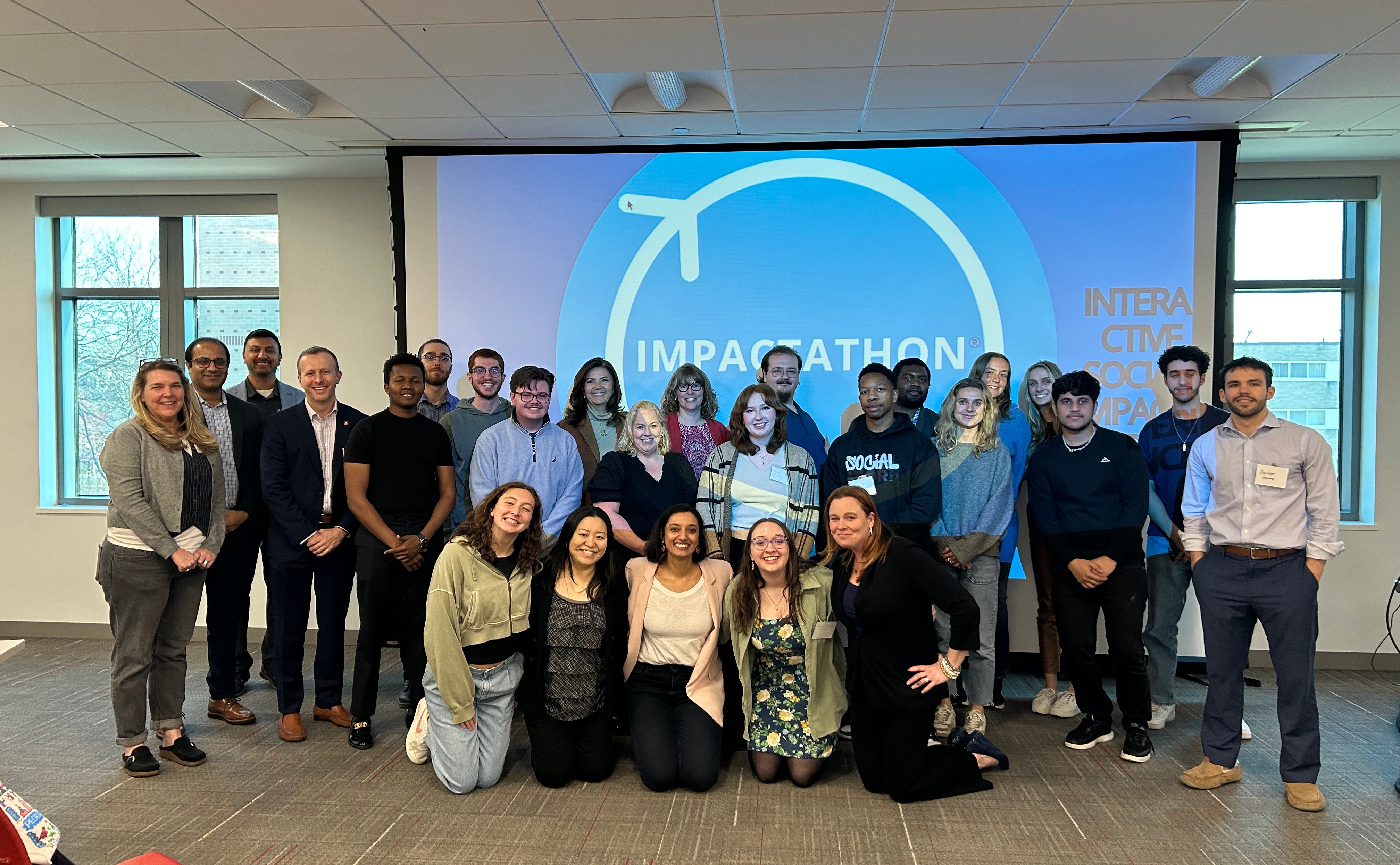 A group photo at the Impactathon event.