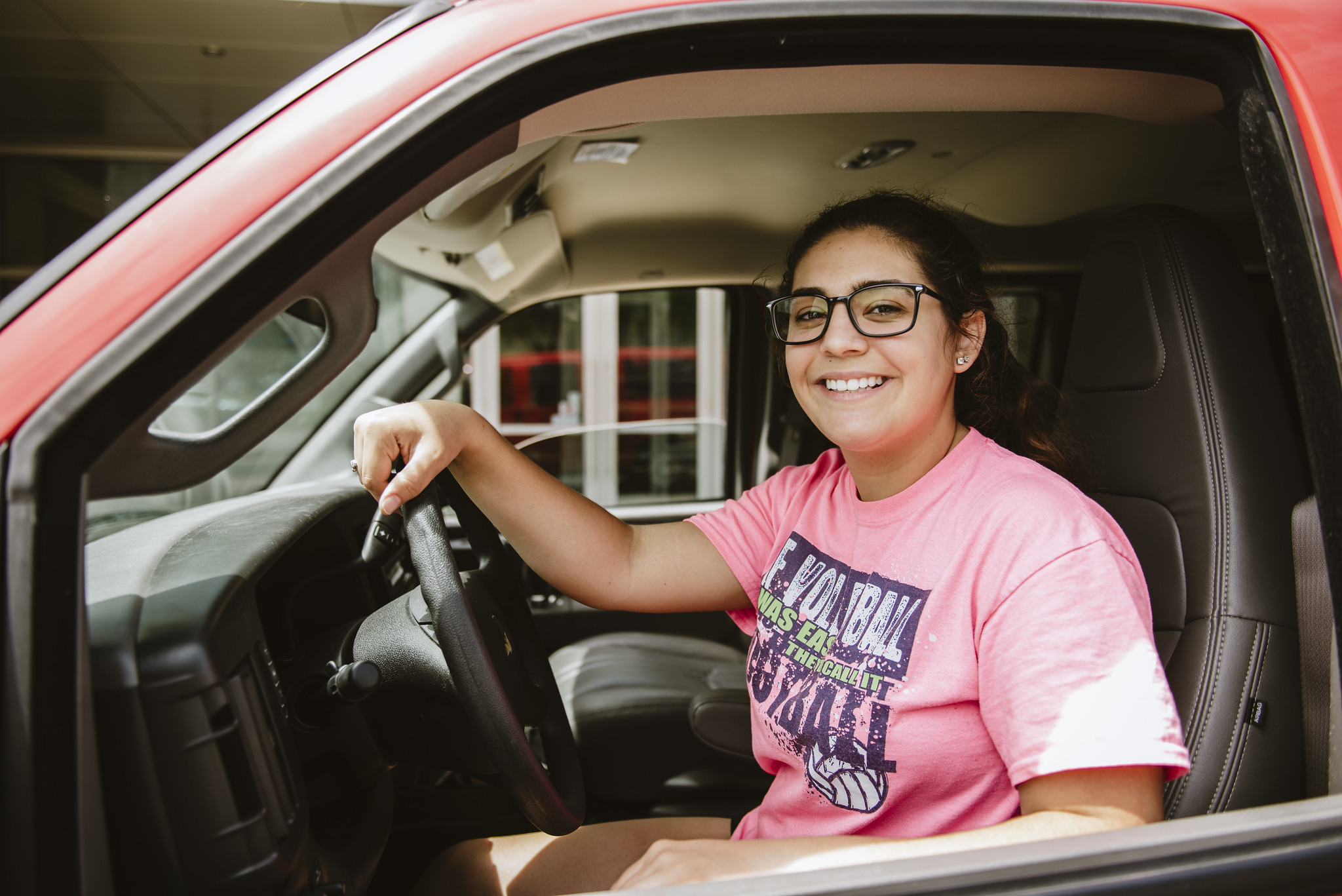 A North Central College Cardinal Shuttle driver.