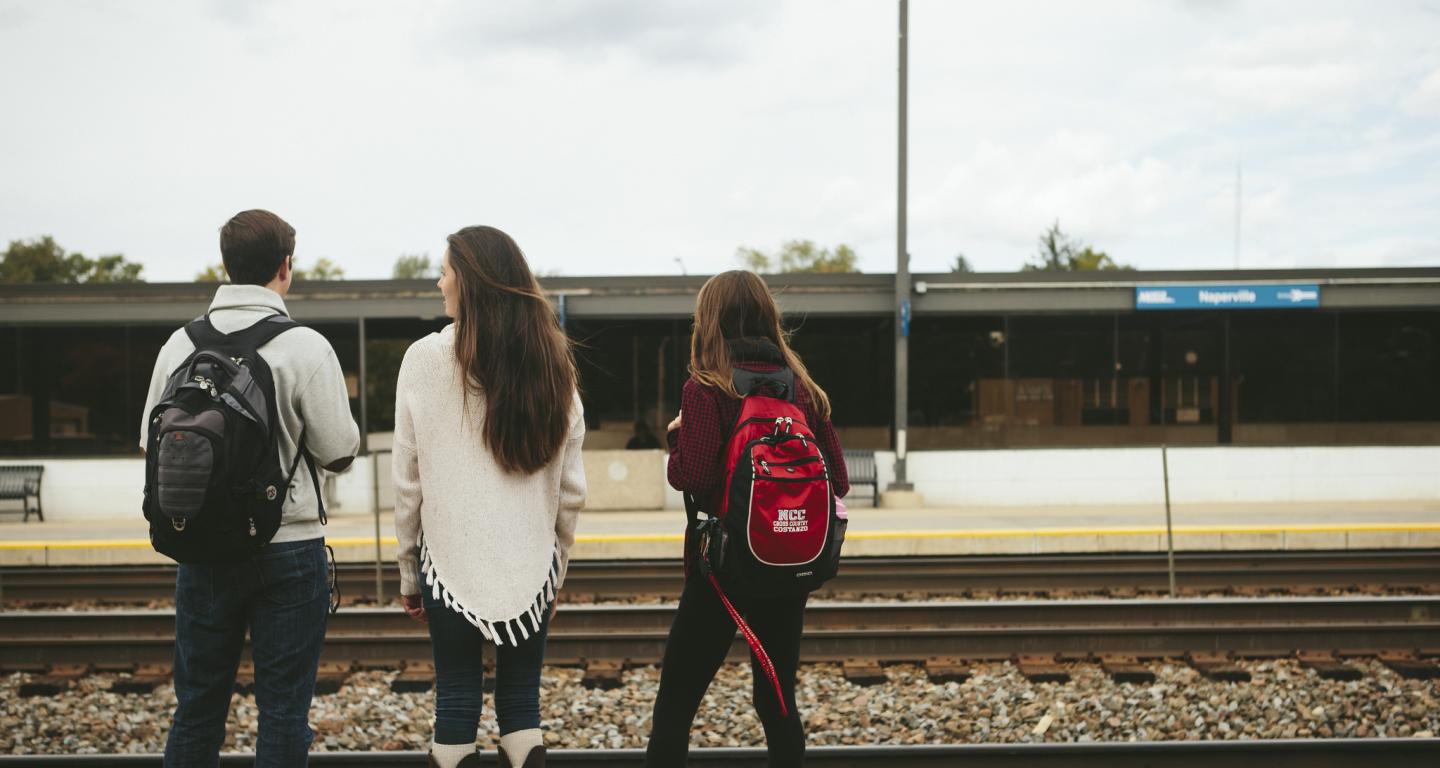 students at train station