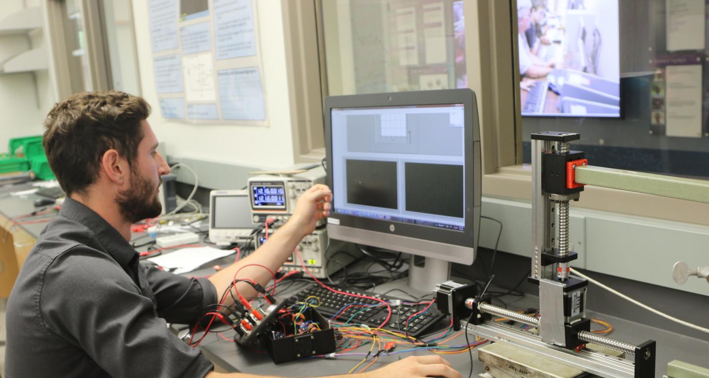 Engineering student working on computer