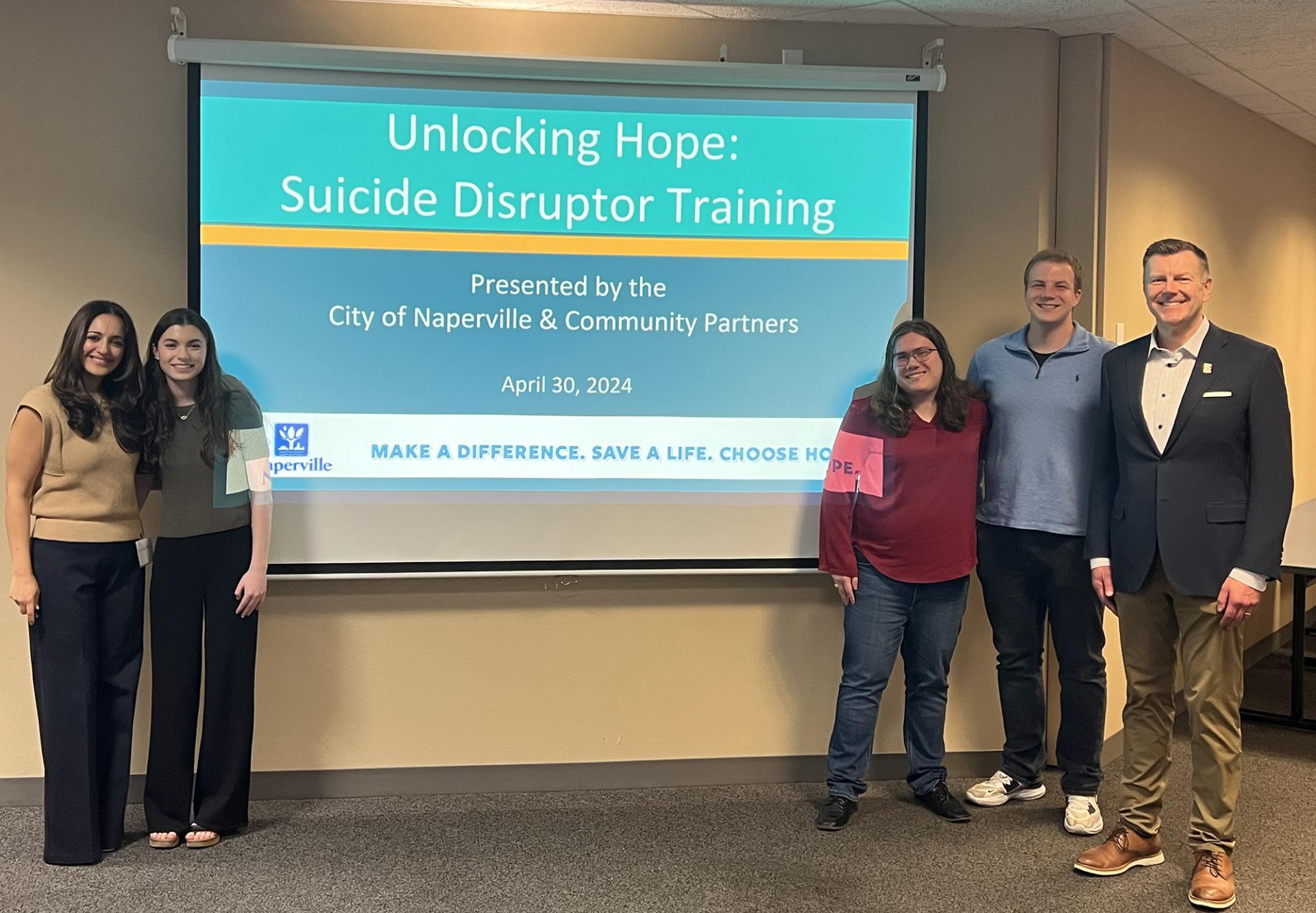 North Central College students, faculty and alumni at a presentation about mental health.
