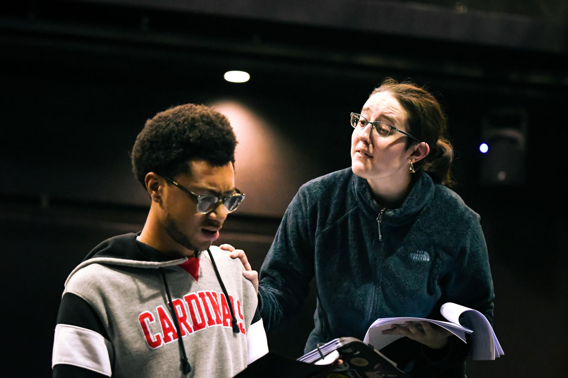 two students rehearsing theatre production